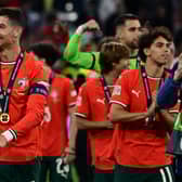 Portugal's players including Portugal's forward #07 Cristiano Ronaldo celebrate after winning the UEFA Nations League final football match between Portugal and Spain in Munich, southern Germany on June 8, 2025. 