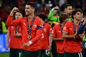Portugal's players including Portugal's forward #07 Cristiano Ronaldo celebrate after winning the UEFA Nations League final football match between Portugal and Spain in Munich, southern Germany on June 8, 2025. 