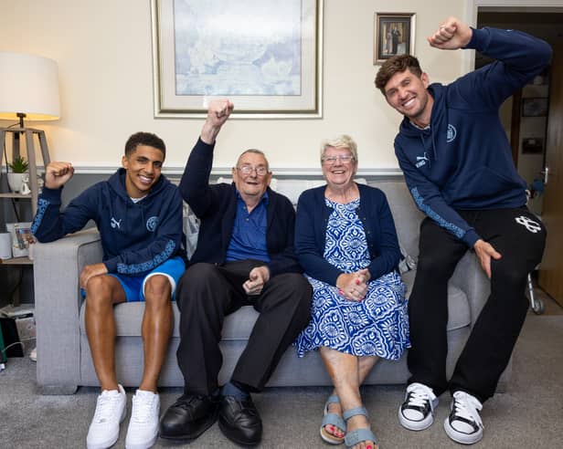 John Stones and Rico Lewis of Manchester City meet a Manchester City fan. Tuesday 10th June 2025