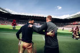 Head Coach Ruben Amorim of Manchester United greets Head coach Graham Potter of West Ham United ahead of the Premier League match between Manchester United FC and West Ham United FC at Old Trafford on May 11, 2025 in Manchester, England. 