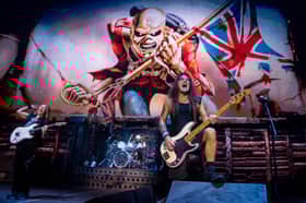 Legendary bassist Steve Harris performing his signature galloping bass lines during a rendition of The Trooper on Iron Maiden's Run For Your Lives tour. 