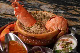 Lobster Dum Biryani and accompaniments.