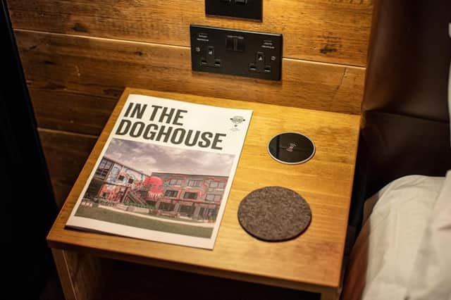 Thoughtful touches at BrewDog DogHouse Manchester include a cheeky welcome guide and handy details right by the bed