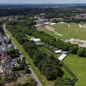 Aerial image shows homes along Sheepfoot Lane next to the construction of the main stage at Heaton park for the upcoming Oasis gig