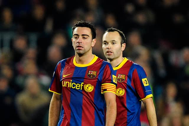 Xavi and Iniesta during their Barcelona prime