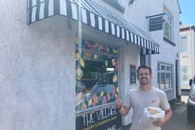YouTuber Tom Cassell outside the Village Bakery and Sandwich Shop in Gee Cross