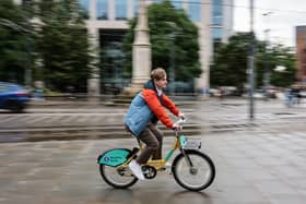 Local democracy reporter Ethan Davies trying out the Manchester Bee Bikes.