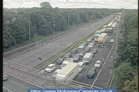 Queueing traffic on the M6 after the stretch between Junction 27 for Wigan and Junction 28 for Leyland was closed both ways