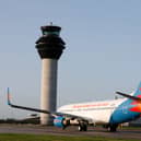 Manchester Airport ATC tower with Jet2 aircraft
