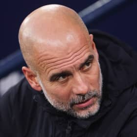 Pep Guardiola looks on as Manchester City take on Bournemouth in the Premier League | Carl Recine/Getty Images