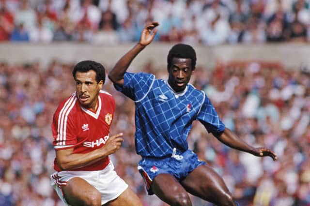 MANCHESTER, UNITED KINGDOM - AUGUST 31: Remi Moses of Manchester United holds off the challenge of Clive Wilson of Chelsea (r) during a First Divsion match at Old Trafford on August 31, 1987 in Manchester, England. (Photo by Allsport/Getty Images)