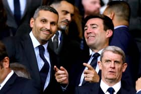 Andy Burnham speaks to Manchester City chairman Khaldoon Al Mubarak prior to the Vincent Kompany testimonial at the Etihad Stadium, Manchester