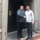 Kevin O`Toole from West Lancashire Group based in Poulton Gary Neville at the handing over the finished Stock Exchange Hotel in Manchester.
