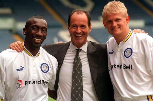 Jimmy Floyd-Hasselbaink is pictured with fellow new signing Alf-Inge Haaland and manager George Graham in June 1997. PIC: Steve Riding
