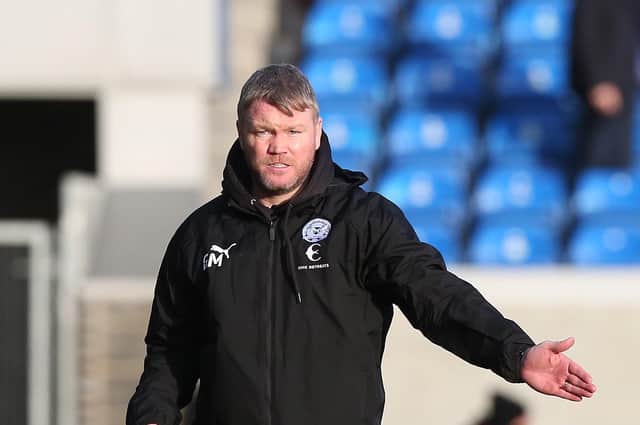 Peterborough United Manager Grant McCann during the defeat at home to Hull City. Credit: Joe Dent/theposh.com.