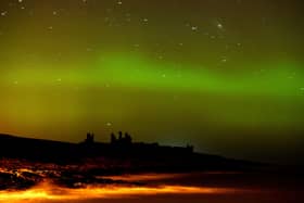 The aurora borealis, or the northern lights as they are commonly known at Dunstanburgh Castle in Northumberland. PRESS ASSOCIATION Photo. Picture date: Tuesday February 17, 2015. See PA story ENVIRONMENT Aurora. Photo credit should read: Owen Humphreys/PA Wire