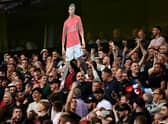 Fans of Manchester United hold up a cardboard cutout of Cristiano Ronaldo during the Premier League match between Wolverhampton Wanderers  and  Manchester United at Molineux on August 29, 2021 in Wolverhampton, England. (Photo by Shaun Botterill/Getty Images)
