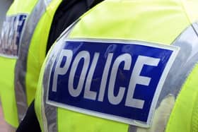 A man in his 30s has been arrested in Bolton on suspicion of attempted murder after attacking another male in a shop in front of staff and members of the public.