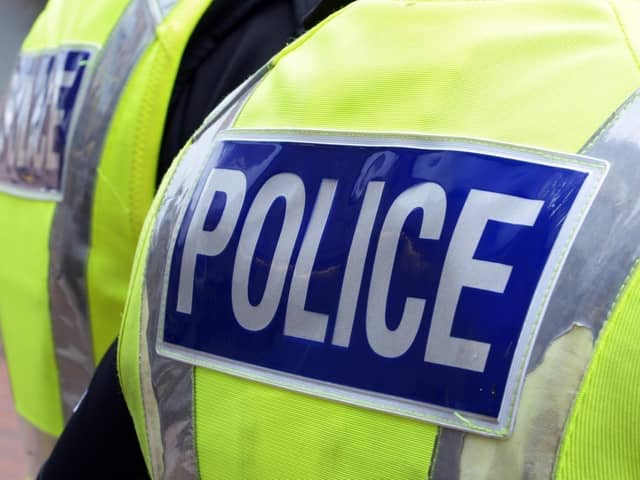 A man in his 30s has been arrested in Bolton on suspicion of attempted murder after attacking another male in a shop in front of staff and members of the public.