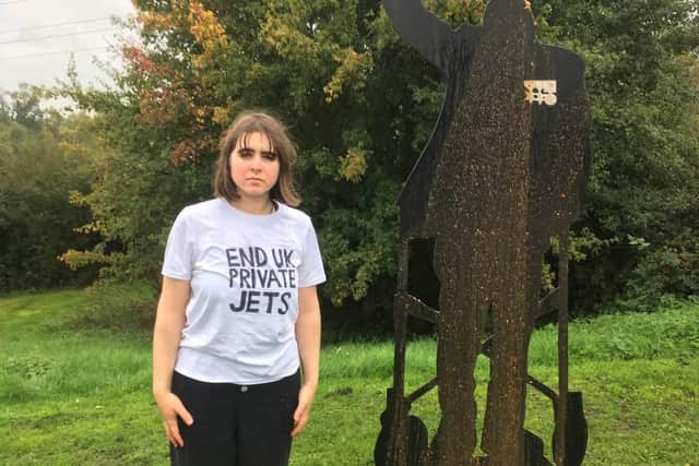 End UK Private Jets supporter Maddie Budd has been charged after she poured human faeces on the Captain Tom memorial (Photo: End UK Private Jets)