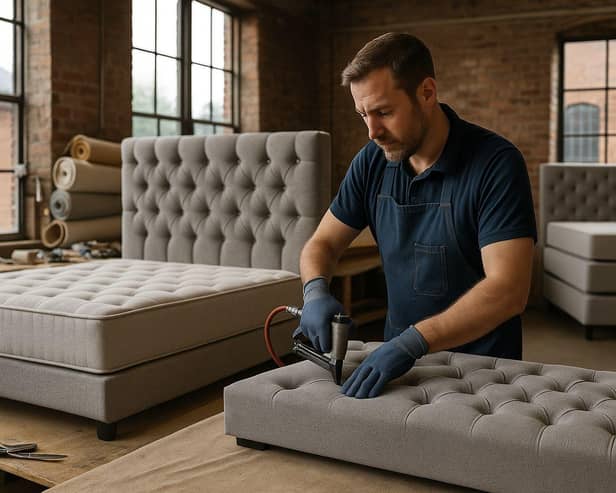 A craftsman upholsters a tufted divan in ComfoRest’s Cleckheaton workshop, highlighting the firm’s Yorkshire-made beds now showcased on its revamped website.