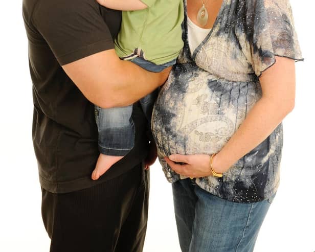 Lindsay O'Malley with husband James and son Joshua while pregnant with baby Rebekah.