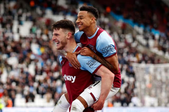 LONDON, ENGLAND - MAY 23: Declan Rice of West Ham United celebrates with team mate Jesse Lingard after scoring his team's third goal during the Premier League match between West Ham United and Southampton at London Stadium on May 23, 2021 in London, England. (Photo by John Sibley - Pool/Getty Images)
