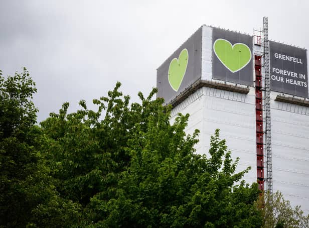 The covered structure of Grenfell Tower in London Photo by Leon Neal/Getty Images