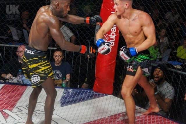 Alex Home (Right) in MMA action