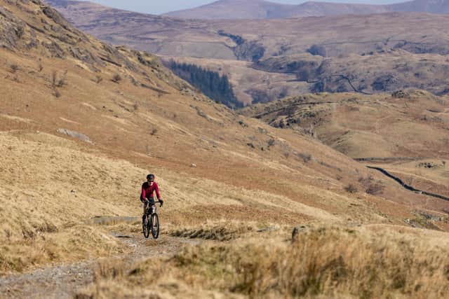 Alex gravel riding on Honister Pass, the Lake District. Photo Credit: Dave MacFarlane.