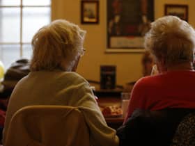 Older people at a charity tea party in London.