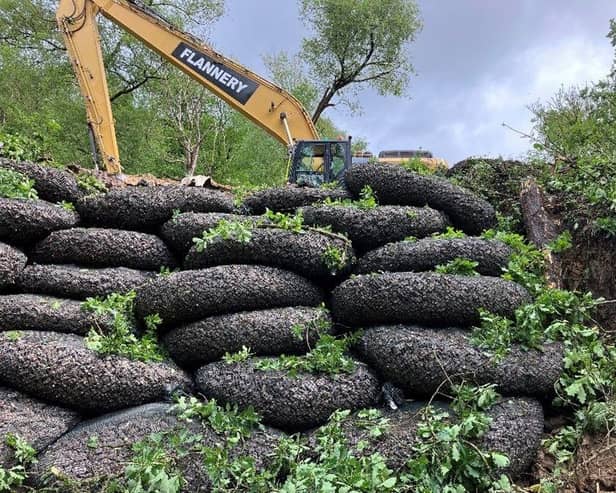 40 tonne excavator lifting 2-tonne rockbags