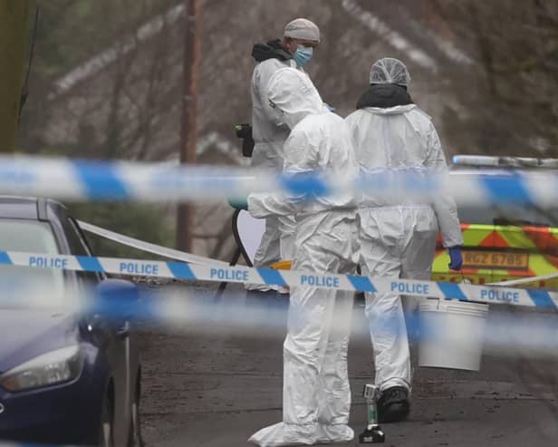 Forensic officers from Police Service of Northern Ireland (PSNI) at the sports complex in the Killyclogher Road area of Omagh