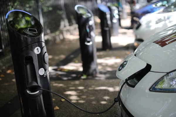 An electric car being charged up (Photo by Dan Kitwood/Getty Images)