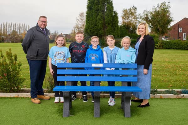 Selco Ashton branch manager Kevin O'Rourke with representatives of the school
