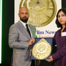 Fiaz Ashraf is presented with his award by Faria Ali of Muslim Aid