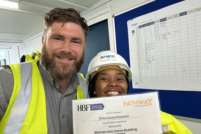 Nobu Ndebele with Gareth Foster, Anwyl assistant site manager, on completion of the Women into Home Building programme