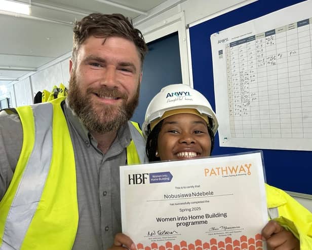Nobu Ndebele with Gareth Foster, Anwyl assistant site manager, on completion of the Women into Home Building programme