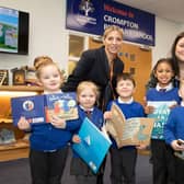 Bellway sales advisor Dawn (left) with headteacher Mrs Croston (right) and pupils from Crompton Primary