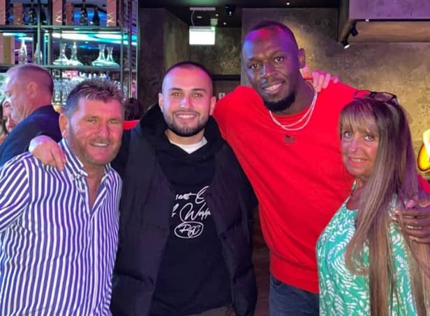 Usain Bolt meets fans at Rendezvous restaurant and bar Credit: Rendezvous 