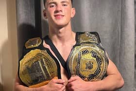 Alex Home MMA Belt Winner