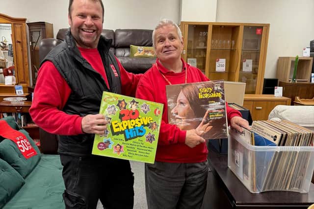 Dave Fahey and volunteer Mike Brittan in Stockport’s BHF shop