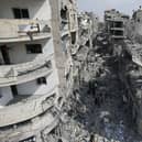 Palestinians look for survivors after the Israeli bombardment of the Gaza Strip in Deir Al-Balah. Picture: AP Photo/Hatem Moussa