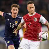 Scotland defender Jack Hendry, pictured with Austria striker Marko Arnautovic, scored in Vienna on Tuesday but had several uncomfortable moments at the back. (Photo by Christian Hofer/Getty Images)