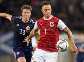 Scotland defender Jack Hendry, pictured with Austria striker Marko Arnautovic, scored in Vienna on Tuesday but had several uncomfortable moments at the back. (Photo by Christian Hofer/Getty Images)
