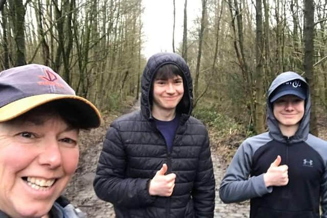 Mum Sharon and her sons, Luke, 18 and Adam, 15