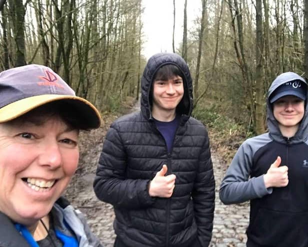 Mum Sharon and her sons, Luke, 18 and Adam, 15