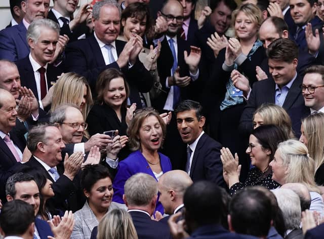 Rishi Sunak is congratulated as he arrives at Conservative party HQ in Westminster, London, after it was announced he will become the new leader of the Conservative party after rival Penny Mordaunt dropped out.