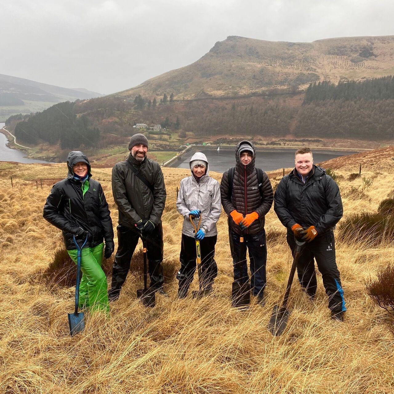 Volunteer Rspb Vernon Building Society volunteers help RSPB plant oak and alder ...