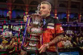Nathan Aspinall celebrates winning the Betfred World Matchplay final at Blackpool's Winter Gardens last year. Picture: PDC